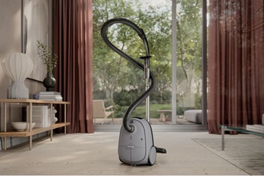 Bagged vacuum cleaner in living room