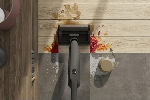 Top view of vacuum cleaner cleaning the floor