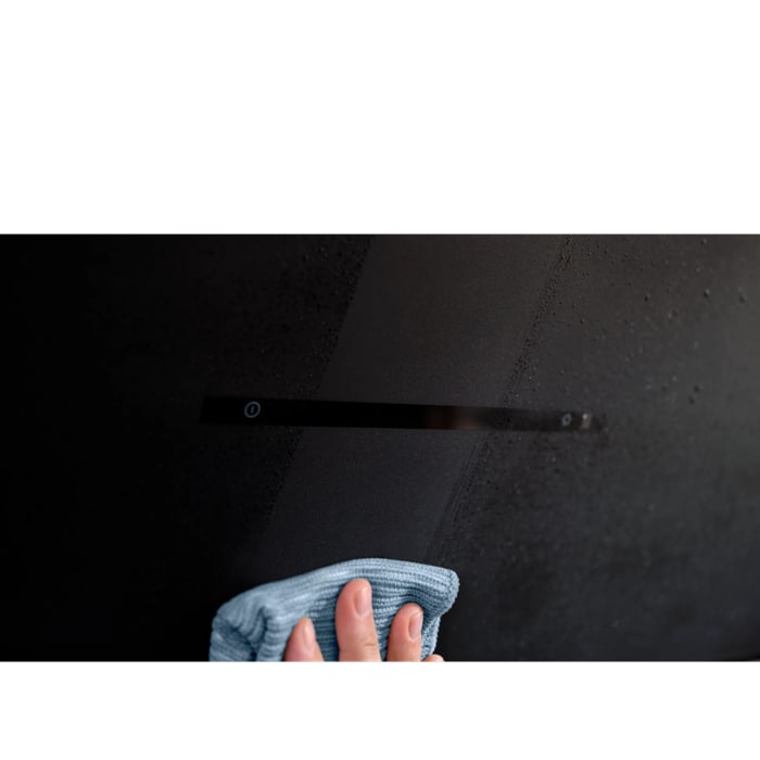 The textural-looking, matt black glass is easy to clean.