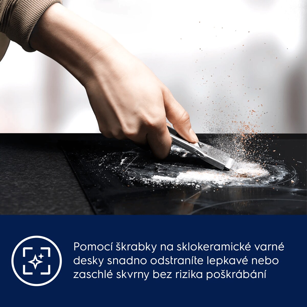 Pomocí škrabky na keramické varné desky snadno odstraníte lepkavé nebo zaschlé skvrny bez rizika poškrábání 