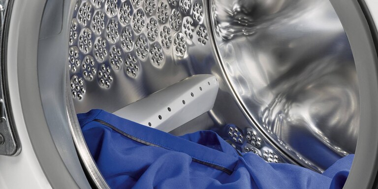 Vyobrazení mezery, kterou je třeba nechat mezi vaším prádlem a stropem bubnu