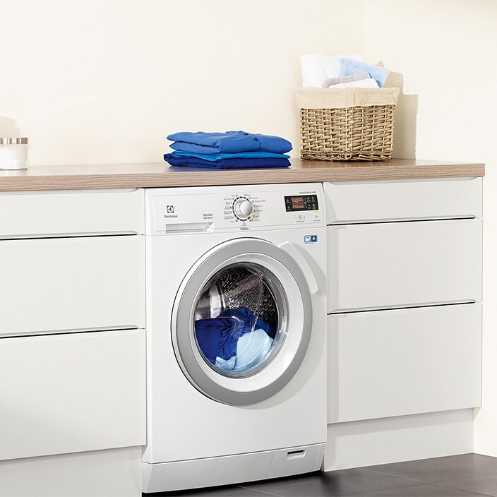 Pračka se sušičkou Electrolux DualCare v prádelně